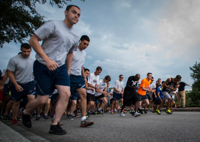 Members of Joint Base Charleston begin the 5K Fitness Challenge Run June 6, 2014, on Joint Base Charleston, S.C. The Fitness Challenge is held monthly to test Team Charleston’s fitness abilities. (U.S. Air Force photo/ Airman 1st Class Clayton Cupit)