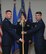 WRIGHT-PATTERSON AIR FORCE BASE, Ohio – Col. David Owens, 445th Operations Group commander, passes the guidon to Lt. Col. Christopher Thompson, incoming 89th Airlift Squadron commander, during the 89 AS Change of Command ceremony May 4. (U.S. Air Force photo/Tech. Sgt. Anthony Springer)