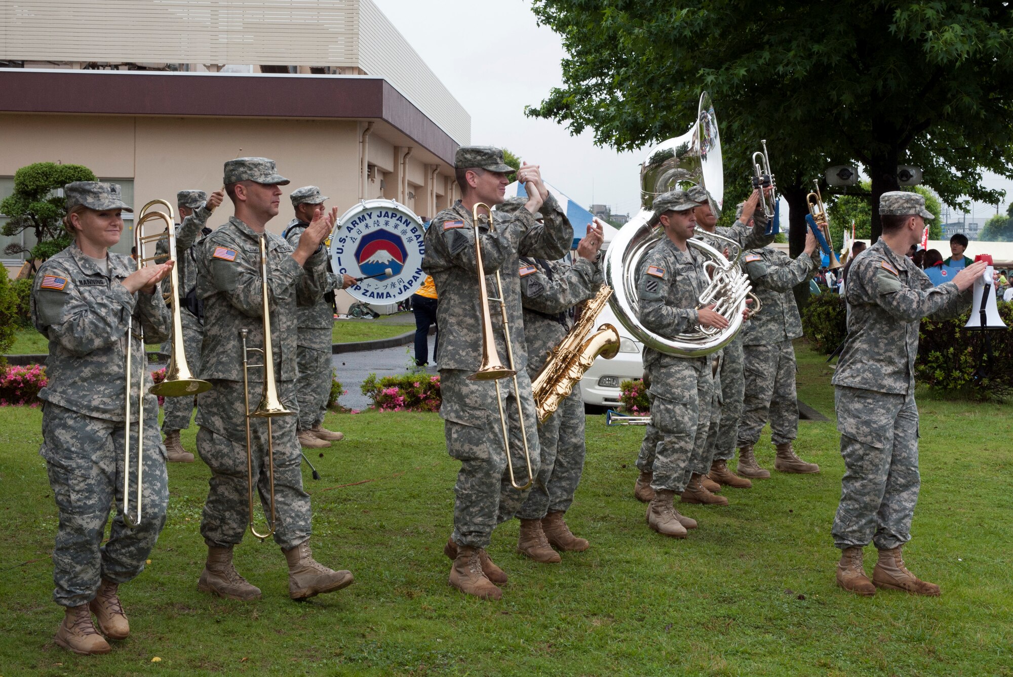 The U.S. Army Japan Band from Camp Zama, Japan, performs at the Ekiden at Yokota Air Base, Japan, June 8, 2014. This year marked the 30th Annual race at Yokota. (U.S. Air Force photo by Senior Airman Desiree Economides/Released)