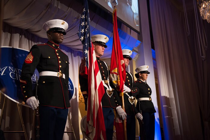 Marines from Marine Corps Base Quantico, Va. present the colors during the Pledge of Allegiance at the 9th Annual National Capital Area A Cinderella Ball here, June 8, 2014. The Marines have played a part in A Cinderella Ball since it’s inauguration in 2006.