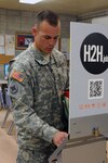 Army 2nd Lt. Joseph Spears, of the Mississippi National Guard's 113th
Military Police Company, enters his personal information in the "Heroes 2 Hired" Kiosk at Camp Shelby Joint Forces Training Center, April 30, 2012. To better equip redeploying soldiers in finding jobs during their redeployment, the Army implemented the H2H program, which is part of the Yellow Ribbon Reintegration Program.