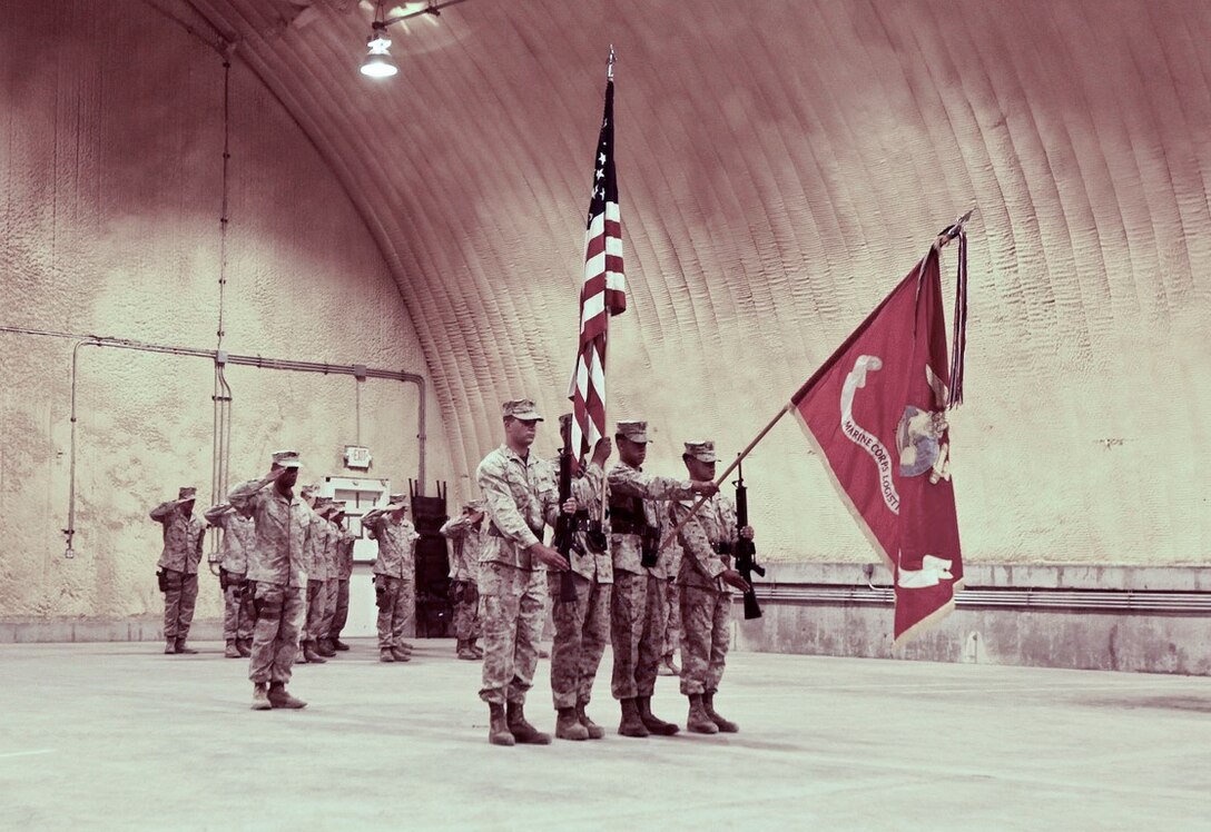 The colors of Marine Corps Logistics Command (Forward) are lowered during a flag folding ceremony aboard Camp Leatherneck, Afghanistan, June 1, 2014. MCLC (Fwd) merged with Redeployment and Retrograde in support of Reset and Reconstitution Operations Group to more efficiently work to redeploy the Corps from Afghanistan.
