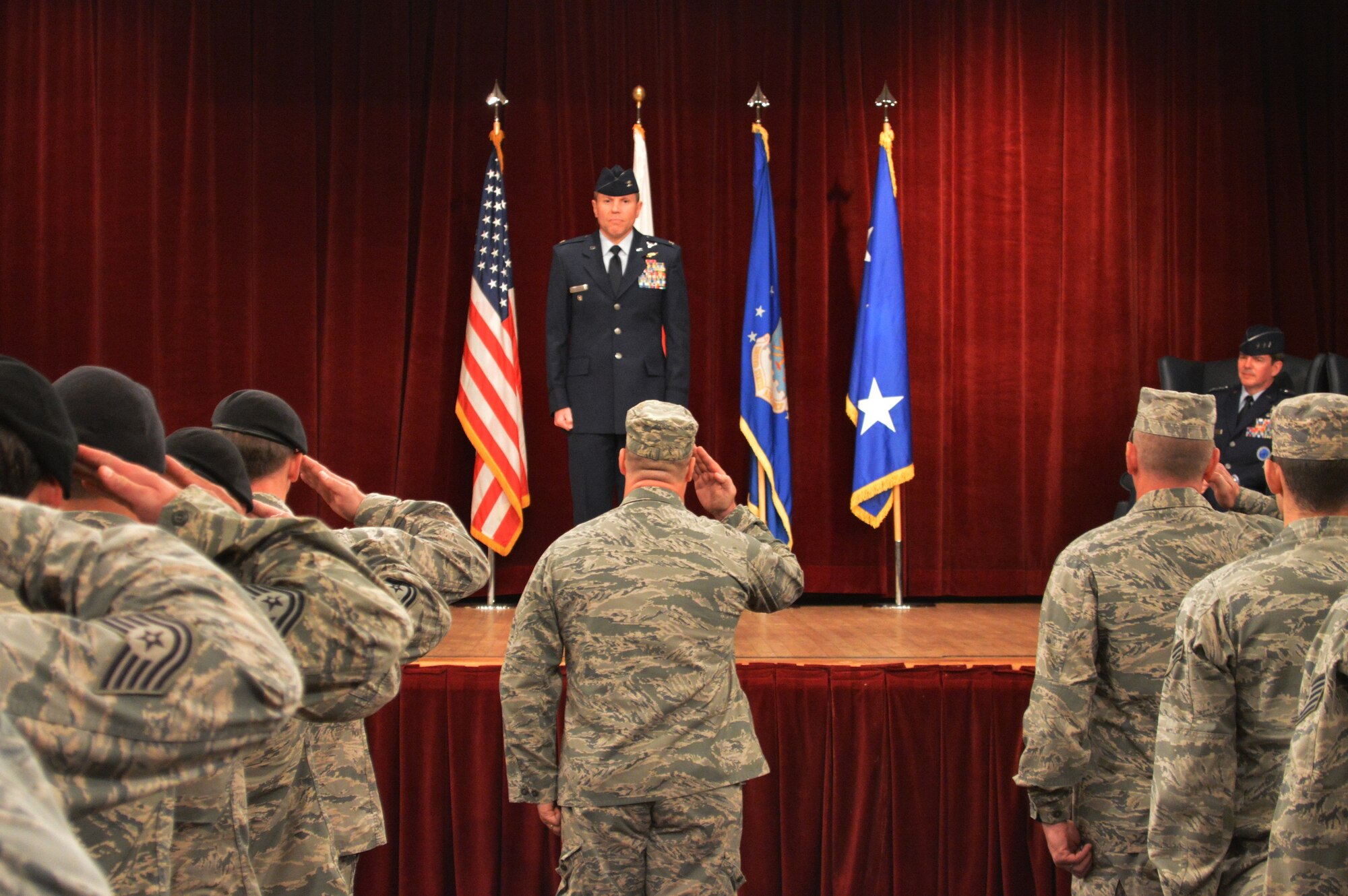 OSAN AIR BASE, Republic of Korea - Col. Tracey Murchison receives his first salute from members of the 607th Air Support Operations Group during a change of command ceremony at the Osan Air Base Officers Club June 9, 2014. Murchison was previously the Director of Plans, Programs and Analyses for 7th Air Force. The 607th ASOG provides air and space power expertise, command and control of close air support and counterfire as well as operationally tailored weather support for U.S. Forces Korea and Army ground and aviation units on the Korean peninsula. It also warehouses war reserve material for "turn-the-key" operations in the event of a hostile attack or emergency. The group is made up of the 604th Air Support Operations Squadron, the 607th Weather Squadron and the 607th Materiel Maintenance Squadron. (U.S. Air Force photo by Tech. Sgt. Thomas J. Doscher)