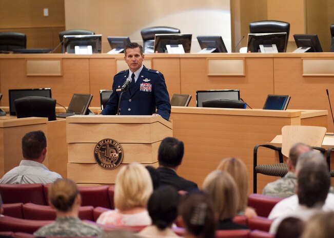 Col. Barry Cornish, 99th Air Base Wing commander, speaks to local and state business leaders and politicians about the benefits of hiring veterans at City Hall June 5, 2014, Las Vegas, Nev. Cornish, along with Las Vegas mayor Carolyn Goodman and Nevada governor Brian Sandoval, spoke to local business leaders about the challenges veterans face in finding work after their military service, along with the benefits that come with hiring a veteran. (U.S. Air Force photo by Airman 1st Class Thomas Spangler)