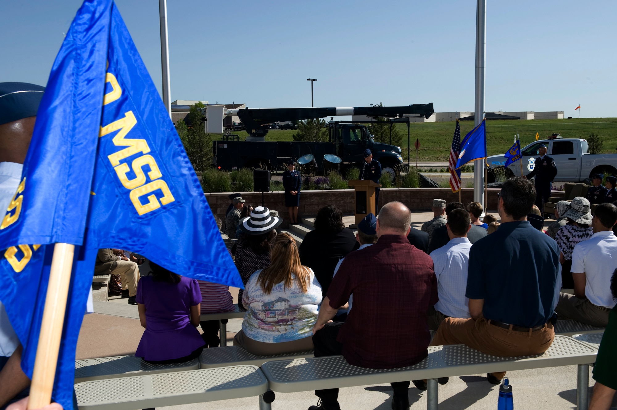 Attendees of the 460th Mission Support Group change of command ceremony listen as Col. Dan Wright, 460th SW commander, provides opening remarks June 10, 2014, at the 460th Space Wing Headquarters on Buckley Air Force Base, Colo. During the ceremony, Col. Rose Jourdan assumed command of the 460th MSG from Col. Robert Uemura.  (U.S. Air Force photo by Senior Airman Phillip Houk/Released)
