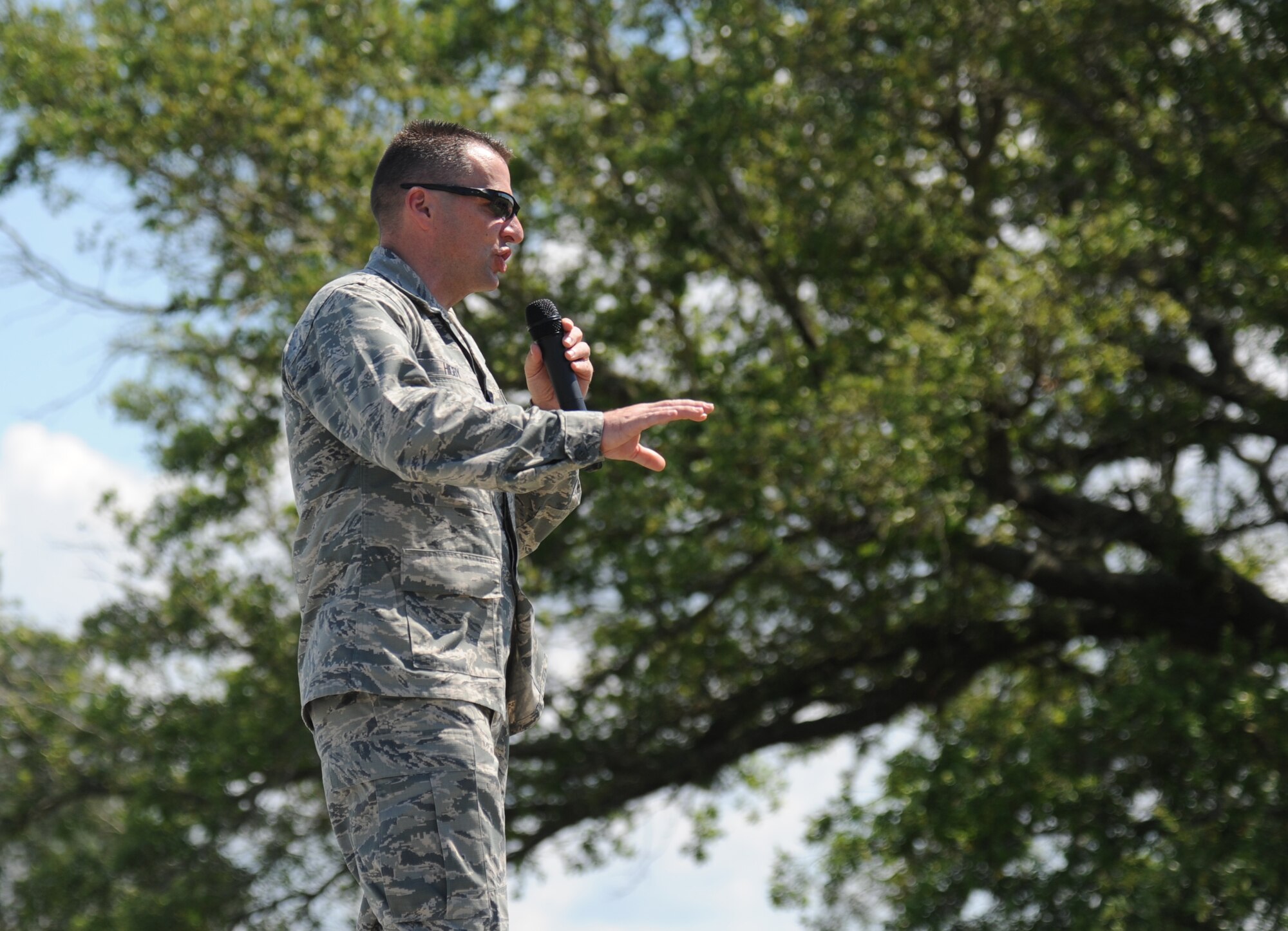 Brig. Gen. Patrick Higby, 81st Training Wing commander, makes closing remarks following the 81st Training Wing Warrior Challenge hosted by the 81st Mission Support Group June 6, 2014, at the Triangle Track, Keesler Air Force Base, Miss.  The event was held in memory of the 70th anniversary of The Normandy Invasion also known as D-Day.  It consisted of nine six-member teams racing in a competition designed to take them through various aspects of a deployment. (U.S. Air Force photo by Kemberly Groue)