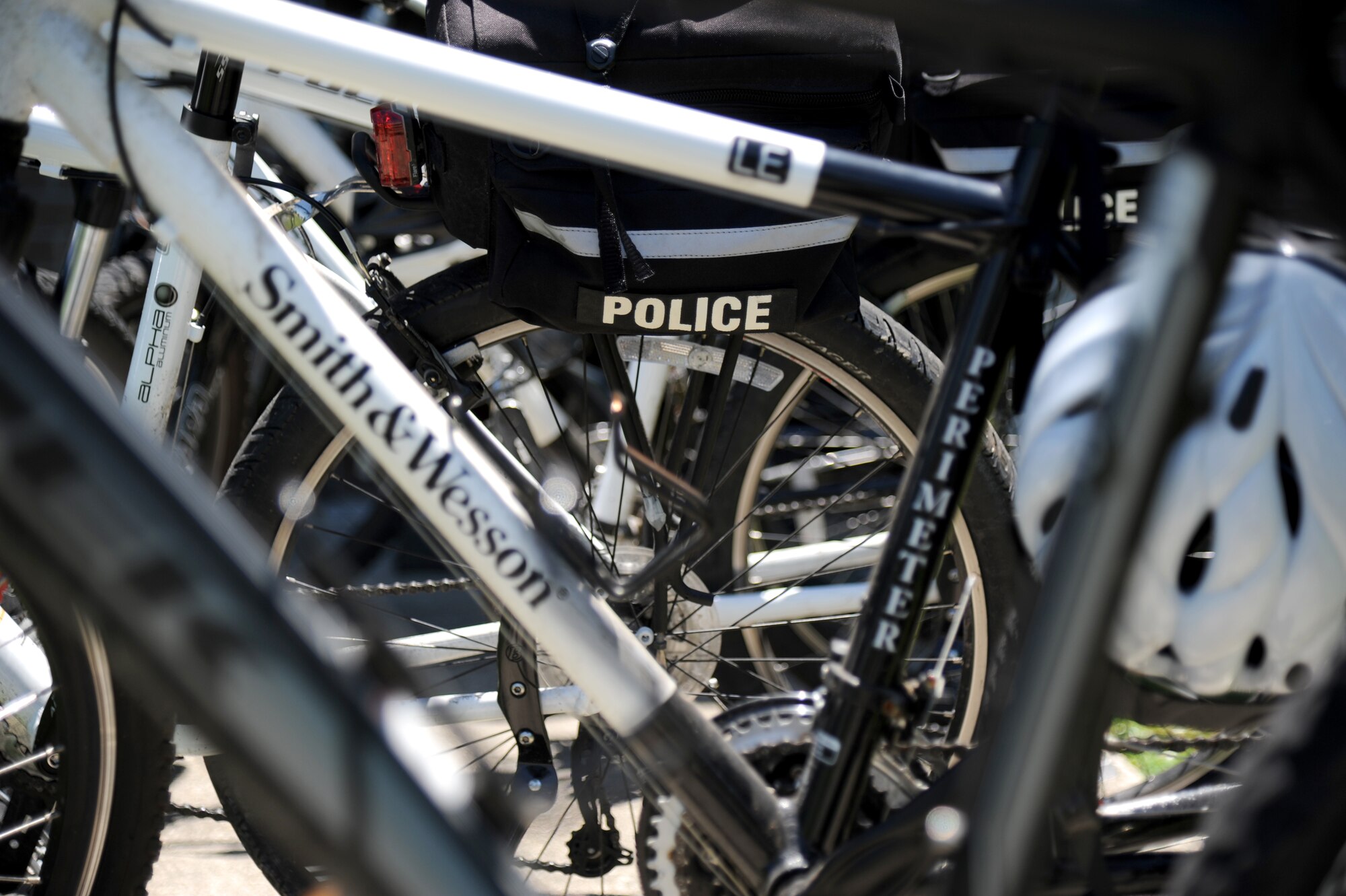A group of police bicycles sit on display to be used by members of the 81st Security Forces Squadron for a bicycle training class June 4, 2014, at the 81st SFS building, Keesler Air Force Base, Miss. The 81st SFS bicycle training class  consists of bike safety, road hazards, proper stopping, use of bike as a defense mechanism, and dismounts at high speed as well as a total bike ride of over 100 miles. (U.S. Air Force photo by Kemberly Groue)