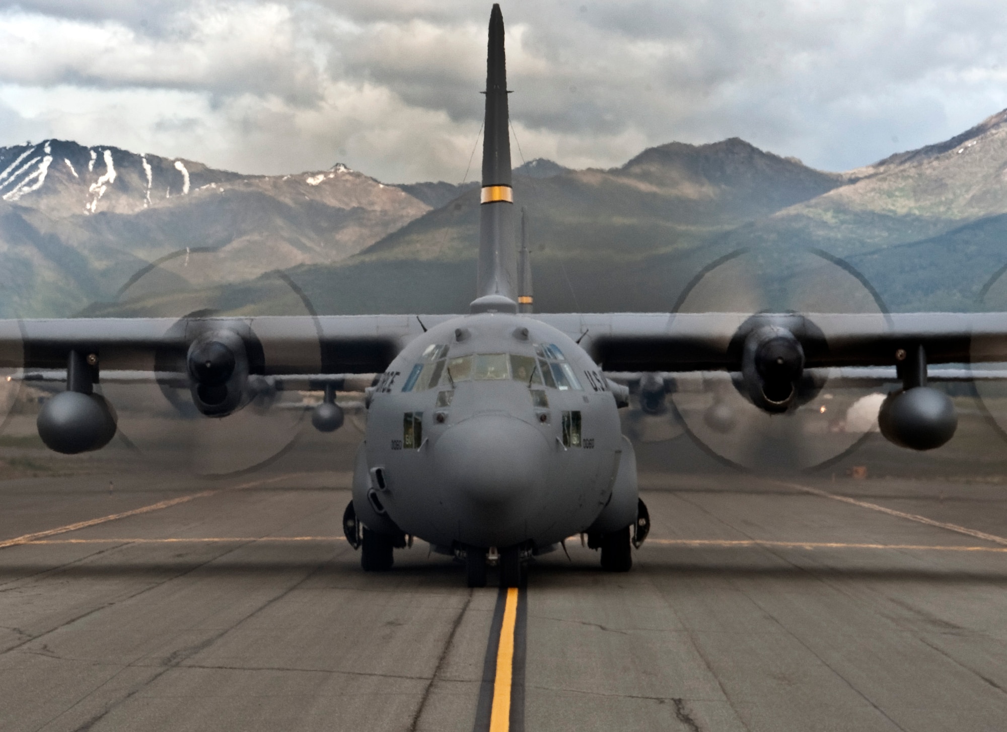 An Alaska Air National Guard C-130 Hercules prepares to take off from Joint Base Elmendorf-Richardson, Alaska, as part of a six-day Joint Forcible Entry Exercise on June 7, 2014. The JFEX was a joint effort between active duty Army, Air Force and Air National Guard units from Alaska, Washington and Guam. (Air Force photo by Staff Sgt. William Banton/ Released)