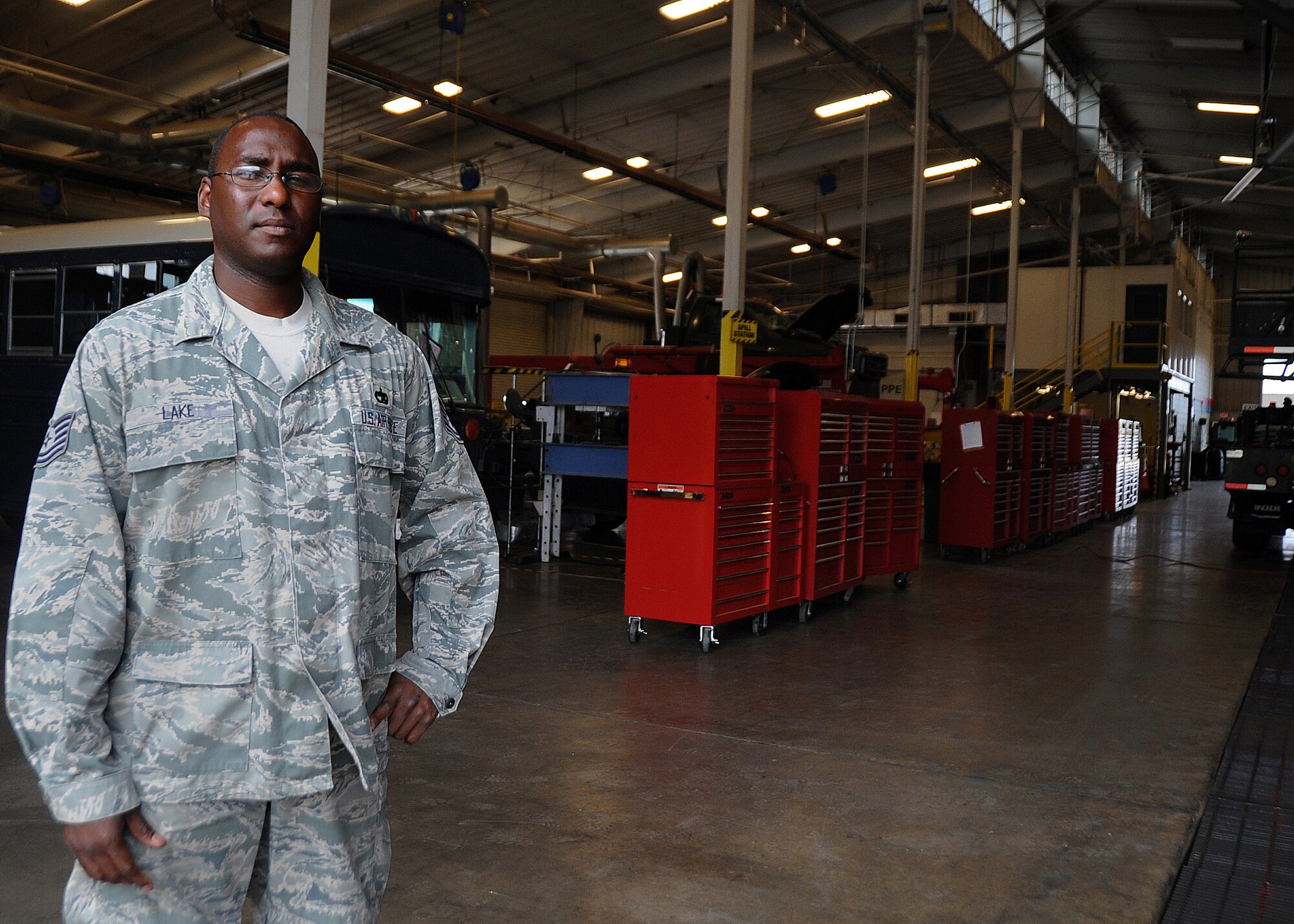 ALTUS AIR FORCE BASE, Okla. – U.S. Air Force Tech. Sgt. Derick Lake, 97th Logistics Readiness Squadron vehicle management section chief, oversees maintenance operations and ensures that personnel are trained appropriately, employed and performing the job safely. The vehicle management flight provides Altus AFB with the vehicle fleet necessary to execute its training mission while providing outstanding customer service to each unit as well as maintenance support to all government procured vehicles and equipment. (U.S. Air Force photo by Senior Airman Franklin R. Ramos/Released)