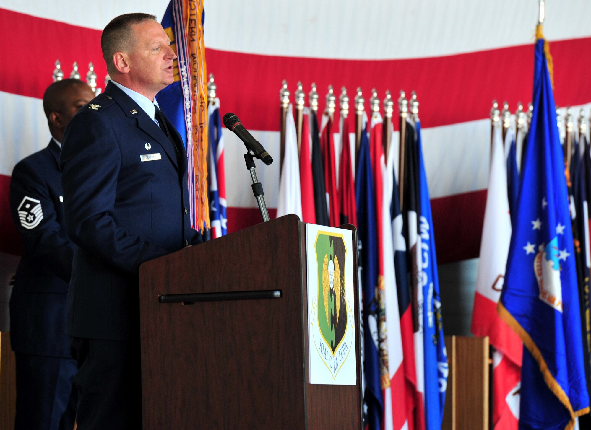 Col. Kieran Denehan speaks at the 5th Operations Group change of command ceremony at Minot Air Force Base, N.D., June 6, 2014. Denehan took the reins as commander from Col. Todd Copeland. (U.S. Air Force photo/Senior Airman Andrew Crawford)