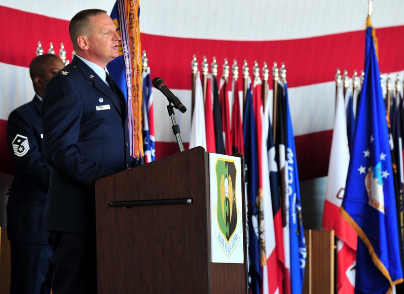 Col. Kieran Denehan speaks at the 5th Operations Group change of command ceremony at Minot Air Force Base, N.D., June 6, 2014. Denehan took the reins as commander from Col. Todd Copeland. (U.S. Air Force photo/Senior Airman Andrew Crawford)