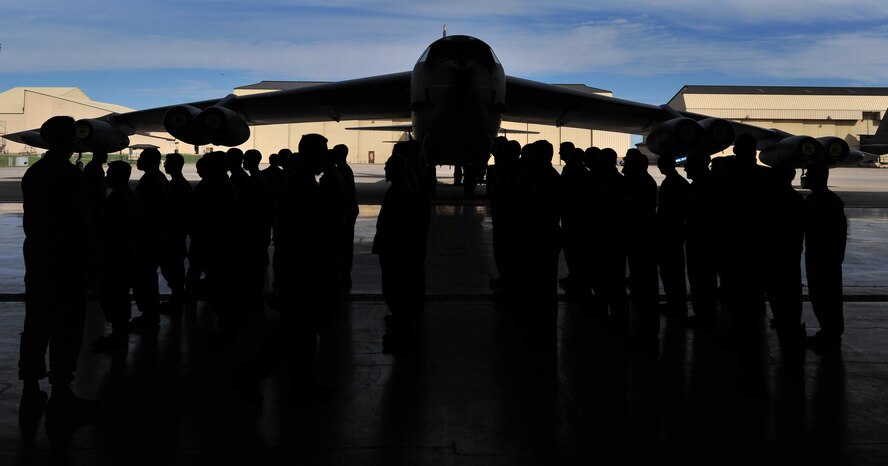 Airmen from the 5th Operations Group await their first salute to their new commander during a change of command ceremony at Minot Air Force Base, N.D., June 6, 2014. Col. Kieran Denehan took the reins as commander from Col. Todd Copeland. (U.S. Air Force photo/Senior Airman Andrew Crawford)