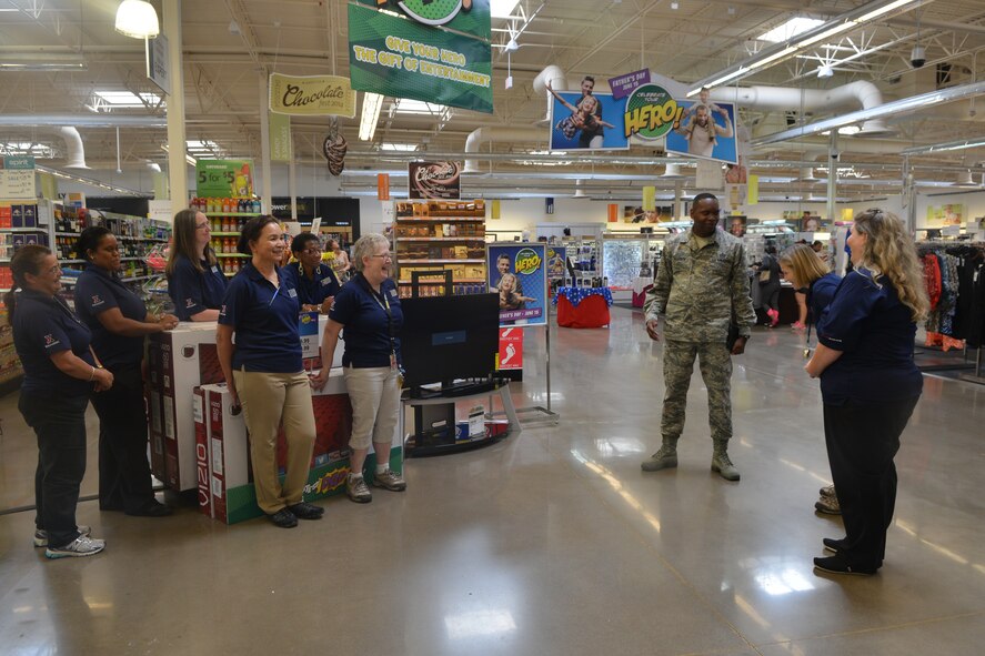 U.S. Air Force Chief Master Sgt. Tony Pearson, Army & Air Force Exchange Service senior enlisted advisor, talks to the staff at The Exchange before his departure at Shaw Air Force Base, S.C., June 4, 2014. Pearson is one of 54 active-duty service members assigned to The Exchange to carry out this mission. (U.S. Air Force photo by Senior Airman Ashley Gardner/Released)