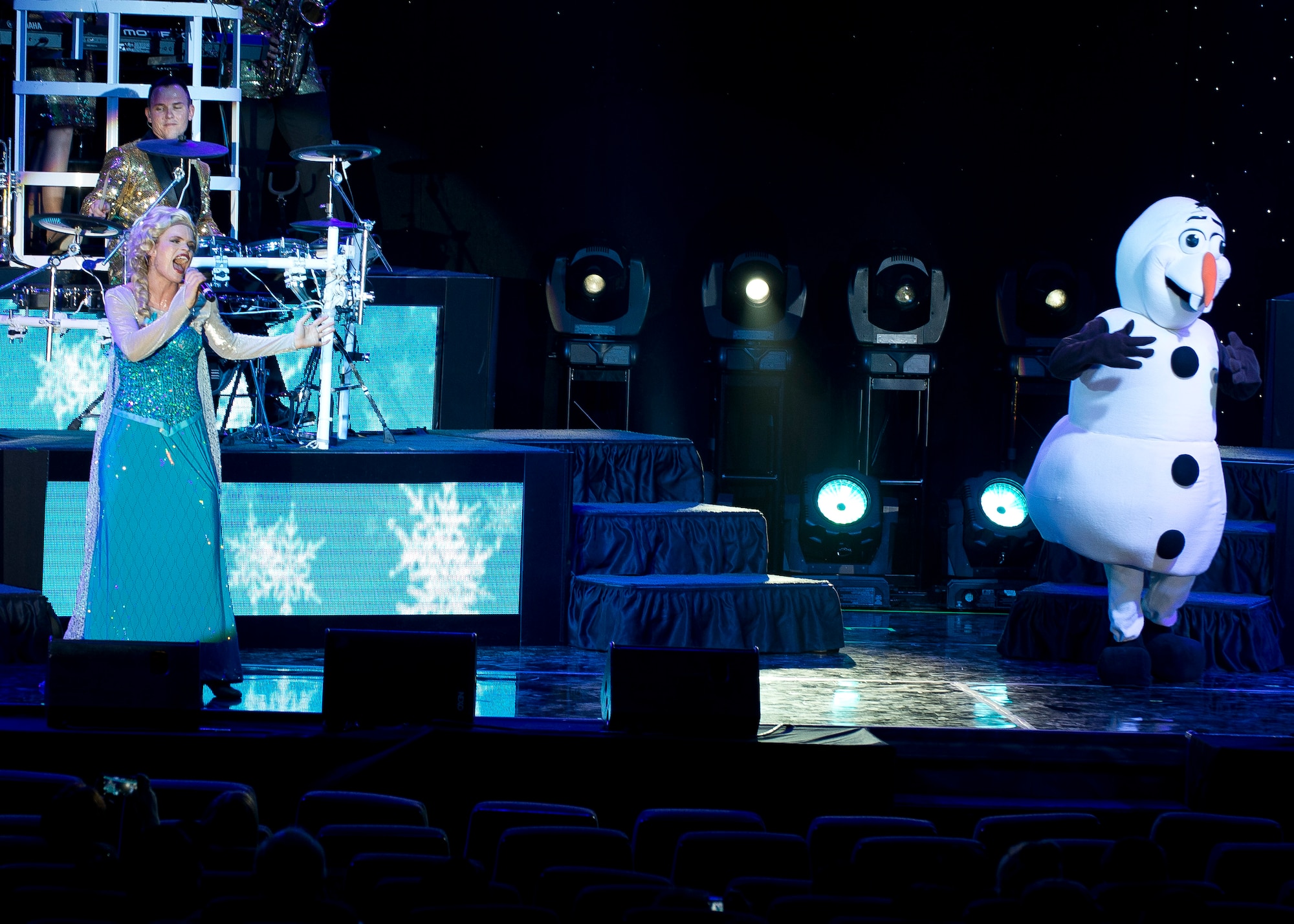 A singer performs "Let it Go" from the hit movie "Frozen."  (U.S. Air Force photo by Ethan Wagner)