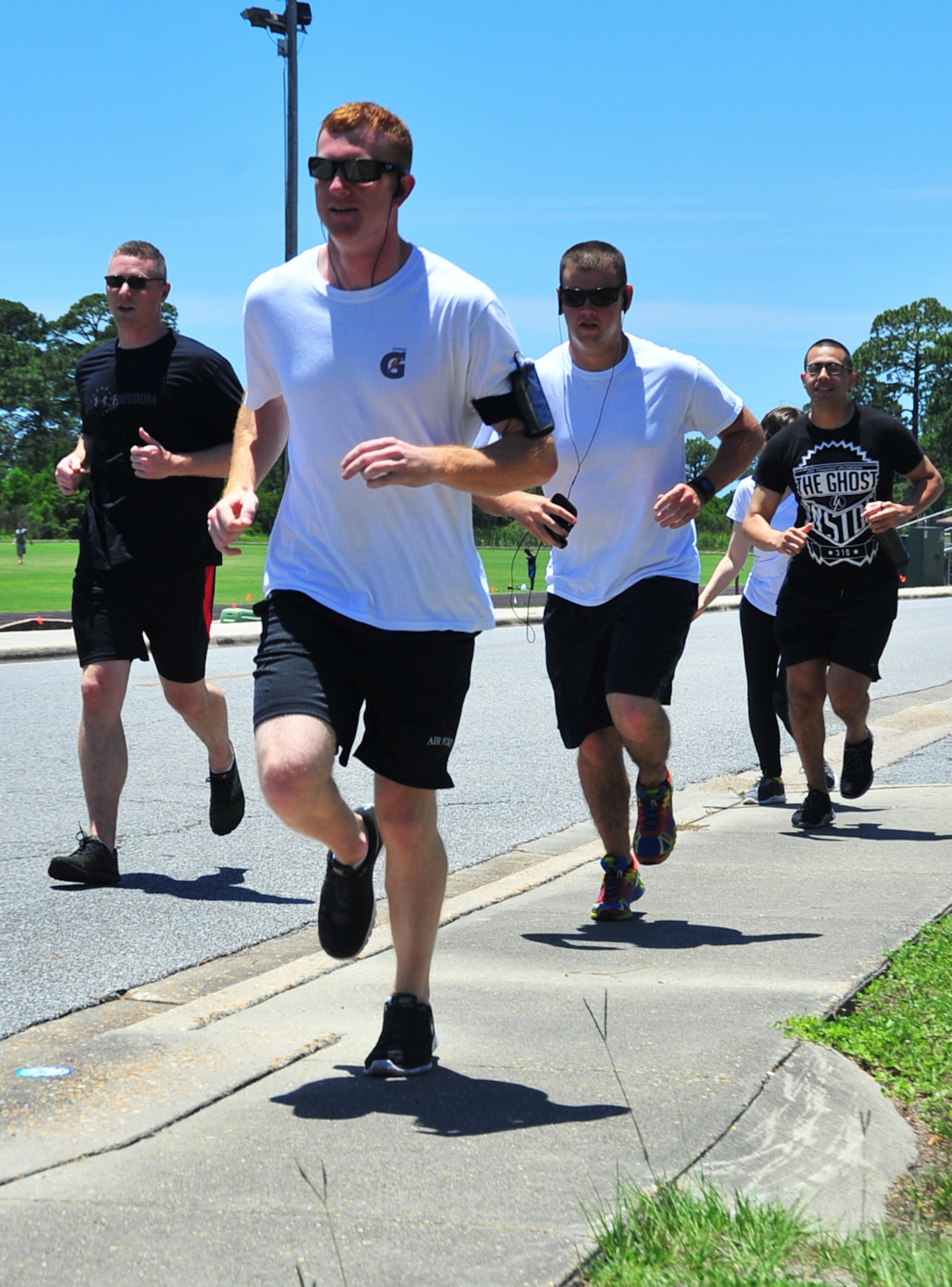 Members of Team Tyndall participate in 5K June 9 as part of the quarterly Comprehensive Airman Fitness Day. This CAF Day was focused on Sexual Assault Prevention Response. (U.S. Air Force photo by Airman 1st Class Sergio Gamboa)