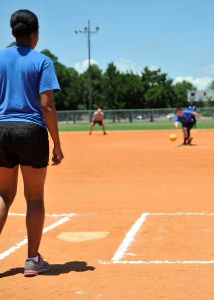 Members of Team Tyndall participate in kickball June 9 as part of the quarterly Comprehensive Airman Fitness Day. This CAF Day was focused on Sexual Assault Prevention Response. (U.S. Air Force photo by Airman 1st Class Solomon Cook) 