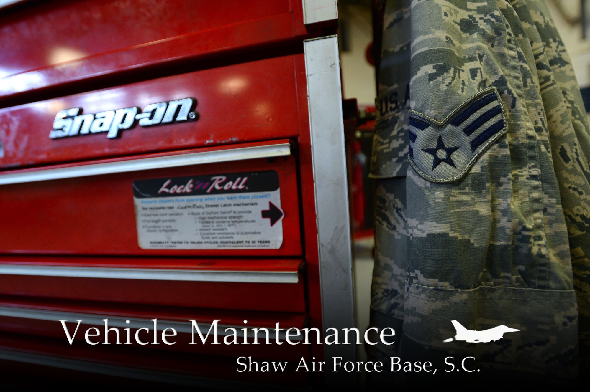 An airman battle uniform is draped on a tool box while its owner performs vehicle maintenance at Shaw Air Force Base, S.C., June 04, 2014. Senior Airman Dexter Tapley, 20th Logistics Readiness Squadron vehicle maintenance journeyman, removes his blouse to prevent build up of grit and grime, which accumulates on him while working. (U.S. Air Force photo illustration by Airman 1st class Jensen Stidham/Released)