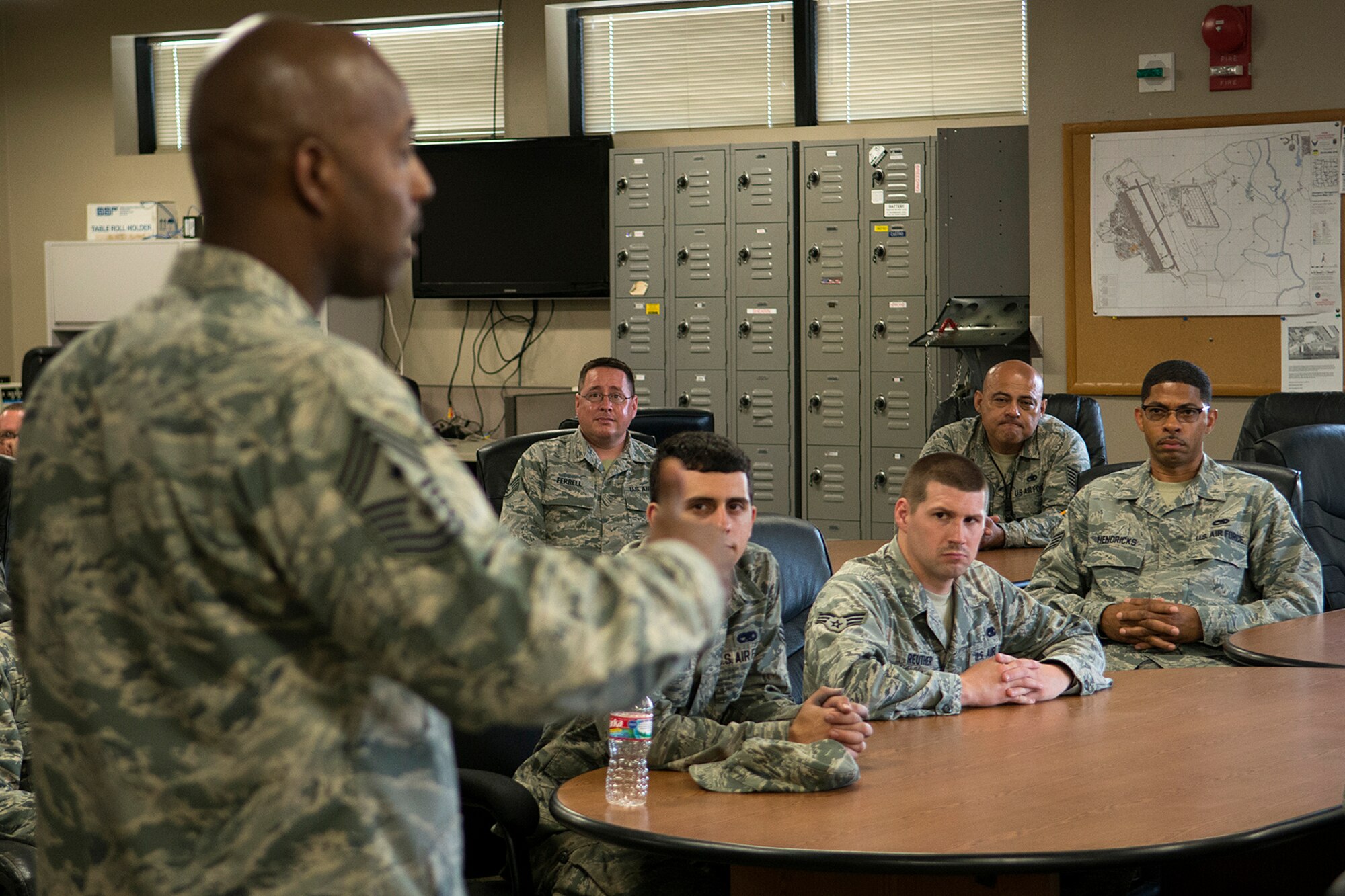 U.S. Air Force Reserve Command Chief Master Sgt. Cameron Kirksey talks to Airmen assigned to the 307th Maintenance Squadron during his visit to the 307th Bomb Wing, June 8, 2014, Barksdale Air Force Base, La. This is Kirksey's first visit to the wing and where he spent two-days touring the different work areas and talking to Airmen. (U.S. Air Force photo by Master Sgt. Greg Steele/Released)