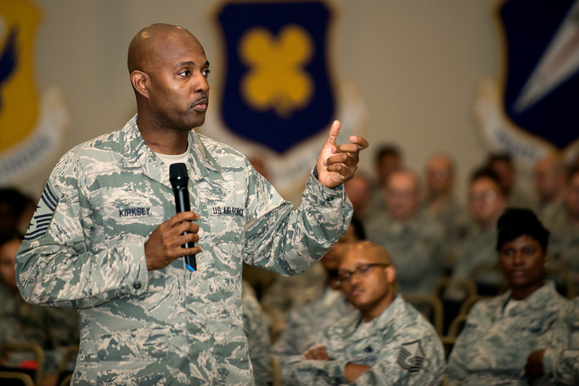 U.S. Air Force Reserve Command Chief Master Sgt. Cameron Kirksey talks to Airmen assigned to the 307th Bomb Wing during an Enlisted Call on June 8, 2014, Barksdale Air Force Base, La. Kirksey visited the wing, touring the different sections to talk to Airmen and address any questions or concerns they may have. (U.S. Air Force photo by Master Sgt. Greg Steele/Released)
