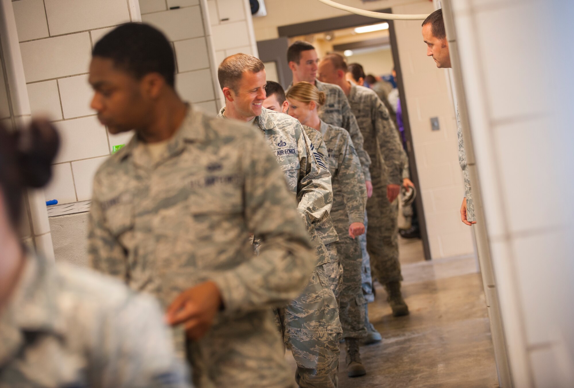 Airmen from the 5th Comptroller Squadron tour the K-9 kennels at Minot Air Force Base, N.D., June 3, 2014. Handlers give tours and demonstrations to different units throughout the year. (U.S. Air Force photo/Airman 1st Class Apryl Hall)