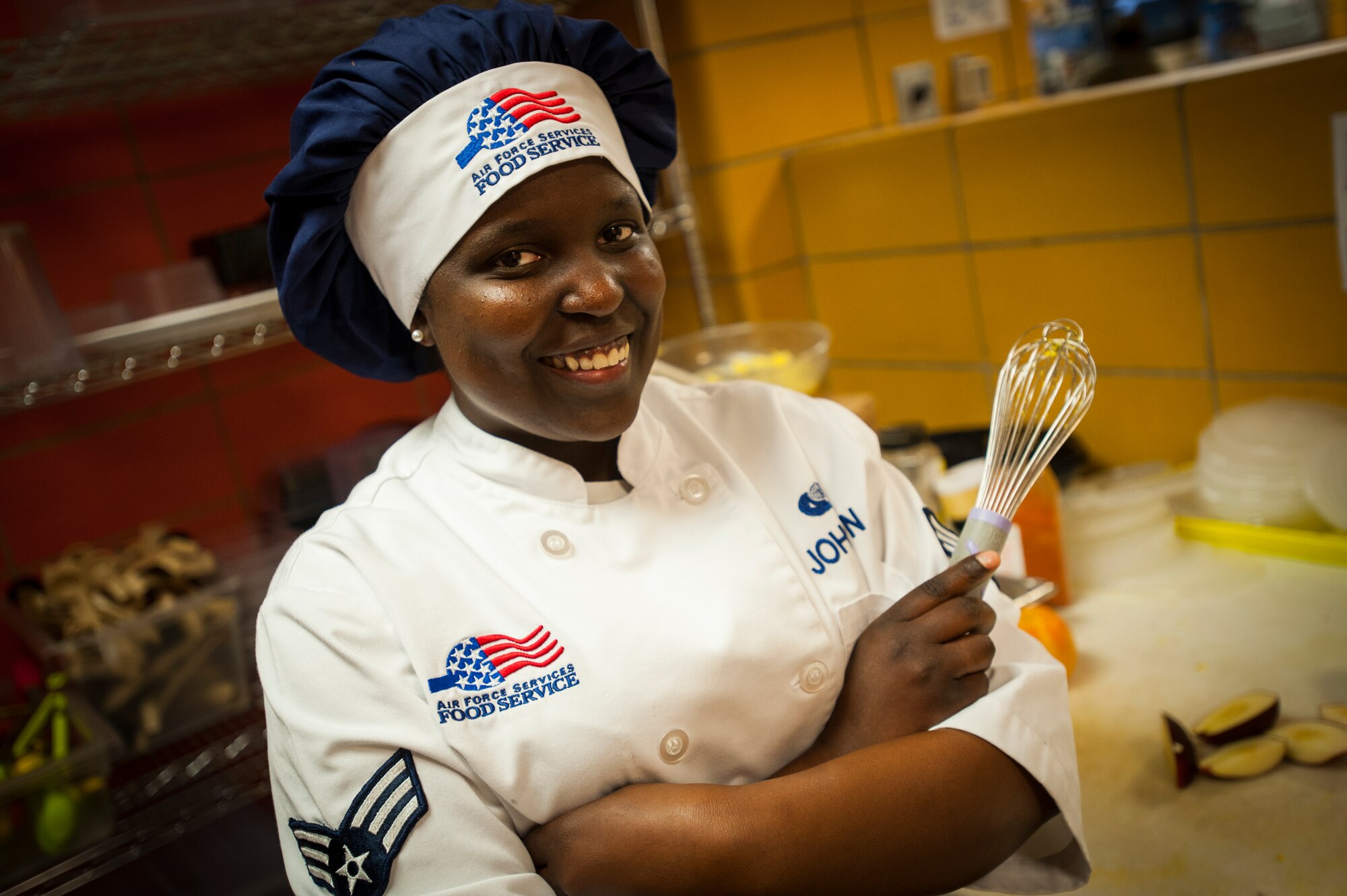 Senior Airman Audreianna Johnson, 5th Force Support Squadron chef, poses for a photograph at the Dakota Inn dining facility at Minot Air Force Base, N.D., June 5, 2014. The dining facility staff works around the clock preparing and serving meals for Airmen. (U.S. Air Force photo/Airman 1st Class Apryl Hall)