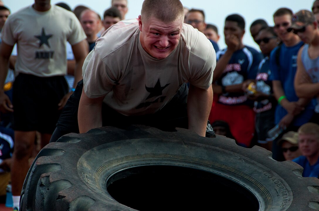 Airmen, Soldiers and Sailors celebrated Armed Forces Day at Sheppard Air Force Base, Texas, by participating in the 9th annual Joint Warrior Challenge, June 7, 2014, at the base one-mile track. The challenge itself consisted of five physically demanding events that pushed each 10 member team to their limits. The 363rd Training Squadron came out on top of the other 16 teams, scoring in the top two of every event. (U.S. Air Force photo/Airman 1st Class Robert L. McIlrath)