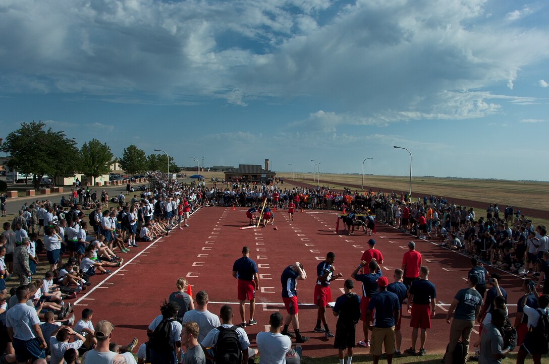 Airmen, Soldiers and Sailors celebrated Armed Forces Day at Sheppard Air Force Base, Texas, by participating in the 9th annual Joint Warrior Challenge, June 7, 2014, at the base one-mile track. The challenge itself consisted of five physically demanding events that pushed each 10 member team to their limits. The 363rd Training Squadron came out on top of the other 16 teams, scoring in the top two of every event. (U.S. Air Force photo/Airman 1st Class Robert L. McIlrath)