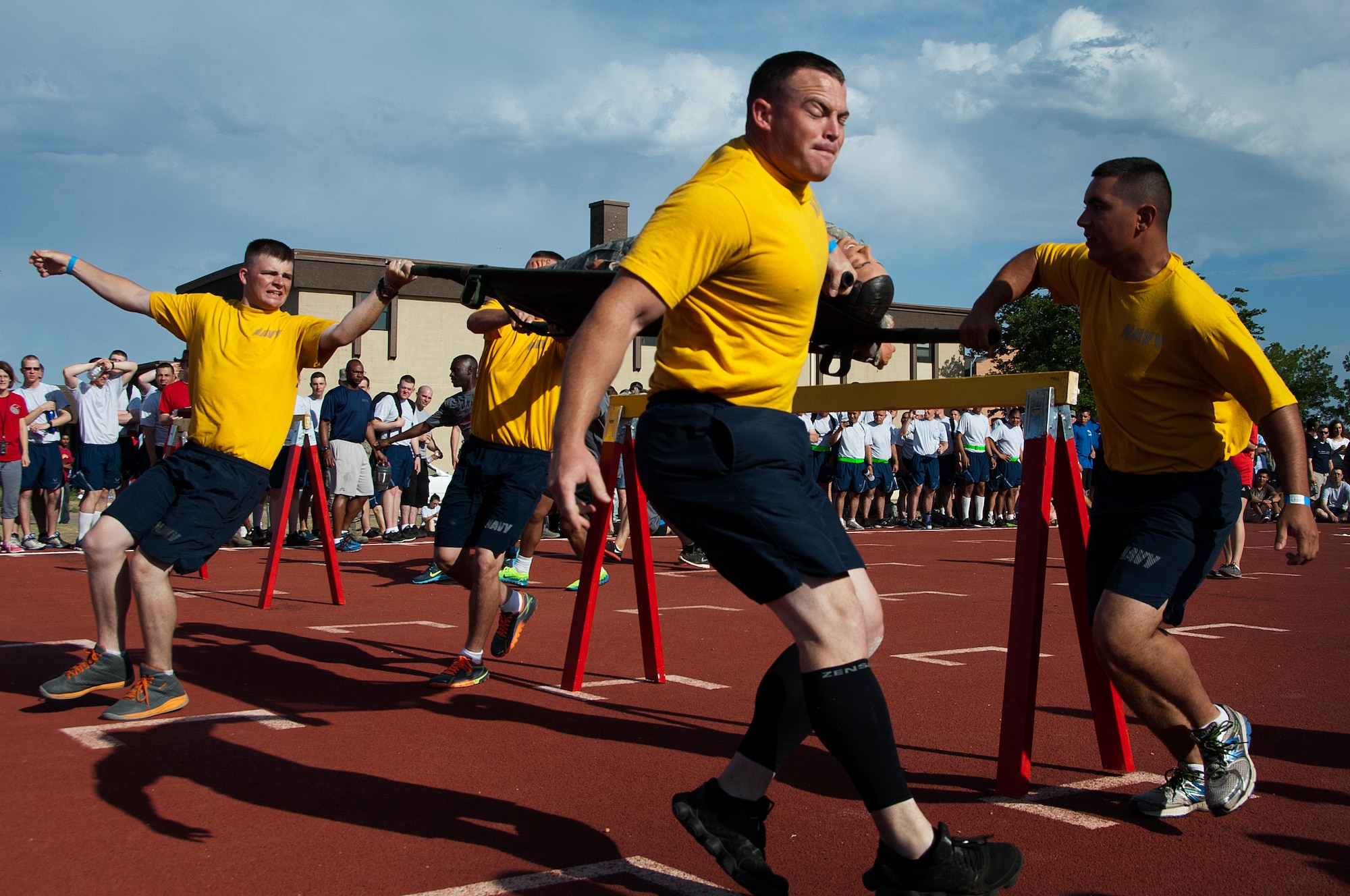 Airmen, Soldiers and Sailors celebrated Armed Forces Day at Sheppard Air Force Base, Texas, by participating in the 9th annual Joint Warrior Challenge, June 7, 2014, at the base one-mile track. The challenge itself consisted of five physically demanding events that pushed each 10 member team to their limits. The 363rd Training Squadron came out on top of the other 16 teams, scoring in the top two of every event. (U.S. Air Force photo/Airman 1st Class Robert L. McIlrath)