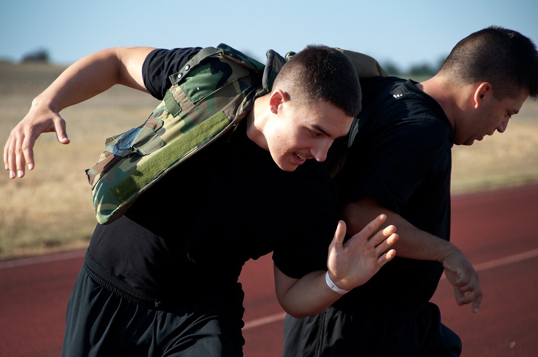 Airmen, Soldiers and Sailors celebrated Armed Forces Day at Sheppard Air Force Base, Texas, by participating in the 9th annual Joint Warrior Challenge, June 7, 2014, at the base one-mile track. The challenge itself consisted of five physically demanding events that pushed each 10 member team to their limits. The 363rd Training Squadron came out on top of the other 16 teams, scoring in the top two of every event. (U.S. Air Force photo/Airman 1st Class Robert L. McIlrath)