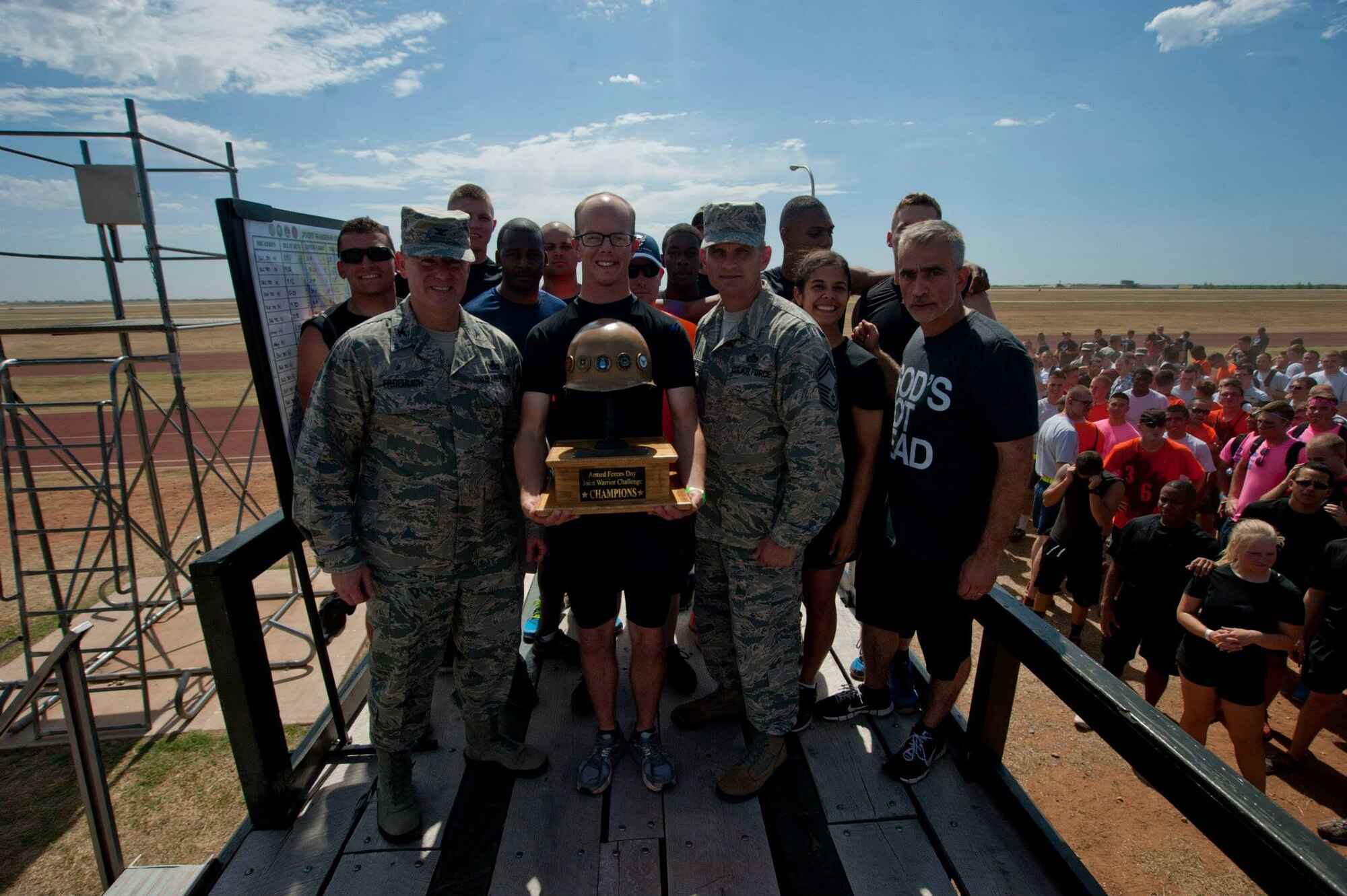 Airmen, Soldiers and Sailors celebrated Armed Forces Day at Sheppard Air Force Base, Texas, by participating in the 9th annual Joint Warrior Challenge, June 7, 2014, at the base one-mile track. The challenge itself consisted of five physically demanding events that pushed each 10 member team to their limits. The 363rd Training Squadron came out on top of the other 16 teams, scoring in the top two of every event. (U.S. Air Force photo/Airman 1st Class Jelani Gibson)