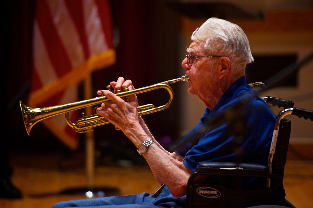 CWO4 (retired) David Hale has been playing Taps since 1934 when he was a boy scout. He played the bugle call during the performance for the Honor Flight DFW WWII veterans, who visited Historic Hangar II's Gabriel Hall. Mr. Hale was an Army Air Corps band director during the war (1942-47) and continued with the Air Force for a full 30 year career. (US Air Force photo by SMSgt Kevin Burns/released)