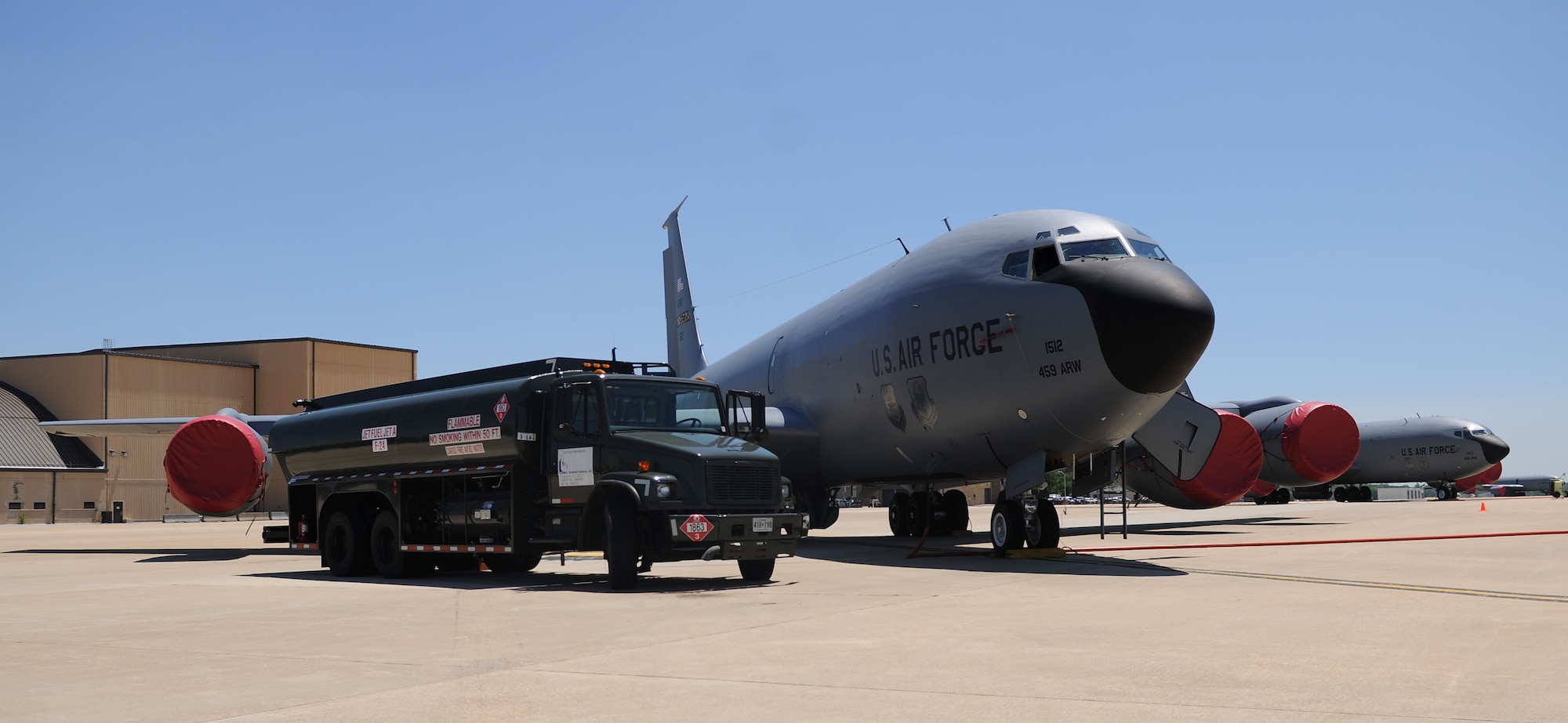 An 11th Logistics Readiness Squadron fuel truck is used to refuel a KC-135 Stratotanker on Joint Base Andrews, Md., June 6, 2014. Andrews recently went through a fuel conversion from JP-8 to JET A, a commercial grade fuel. (U.S. Air Force photo/Airman 1st Class Ryan J. Sonnier)