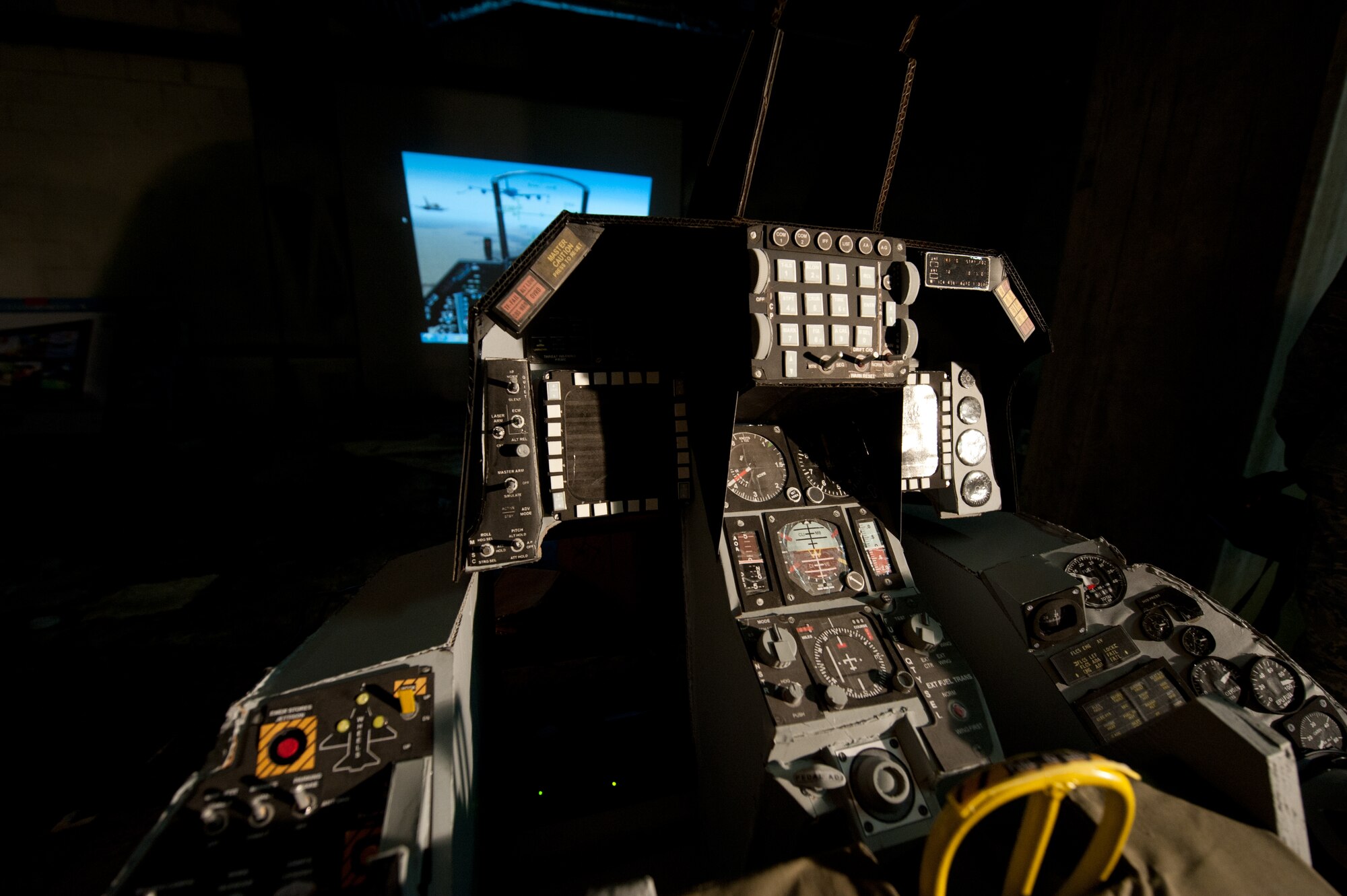 A former U.S. Army crew chief on AH-1 Cobra helicopters, Newport News, Va., resident David Gatling has built an F-16 simulator in the basement of his apartment complex. He said although he can no longer fly, the simulator is his way to stay connected to the world of aviation. (U.S. Air Force photo by Melissa Walther/Released)
