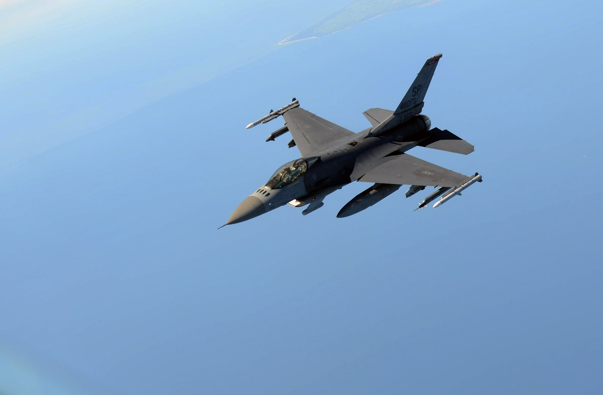 A U.S. Air Force F-16 C/D Fighting Falcon flies during the Baltic Operations Exercise June 9, 2014, over the Baltic Sea. BALTOPS provides the opportunity for participating nations to engage in realistic training to build experience, teamwork and strengthen interoperability while working toward mutual goals. (U.S. Air Force photo/Airman 1st Class Kyla Gifford/Released)
