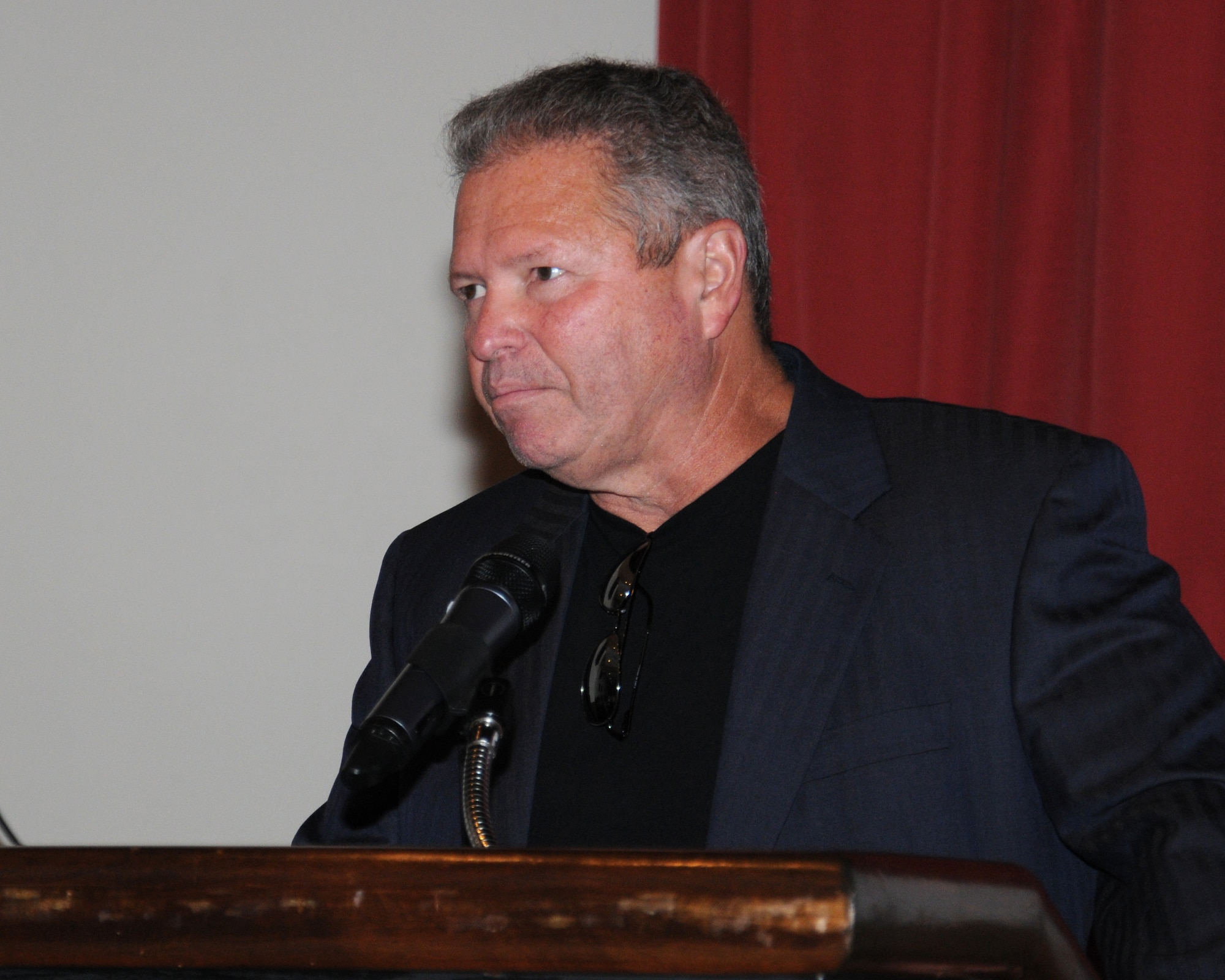 Mark Howell, 100th Air Refueling Wing historian from Odessa, Texas, speaks to Team Mildenhall members during Heritage Day June 6, 2014, on RAF Mildenhall, England. Team Mildenhall members celebrated and remembered their heritage in a number of ways throughout the day including documentaries featuring firsthand accounts of war time. (U.S. Air Force photo/Gina Randall/Released)
