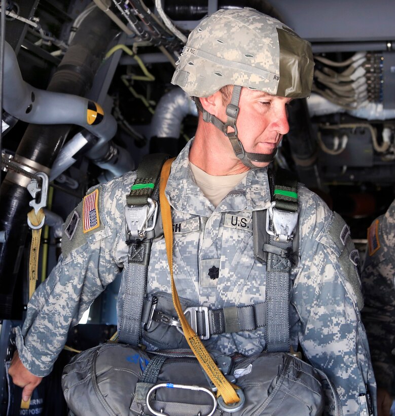 Army Lt. Col. Anthony Rush prepares to jump from a Marine Corps V-22 Osprey aircraft at the National Training Center on Fort Irwin, Calif., June 3, 2014. Rush is the senior officer of the light infantry observer controllers with the center's Tarantula Team, Operations Group.
