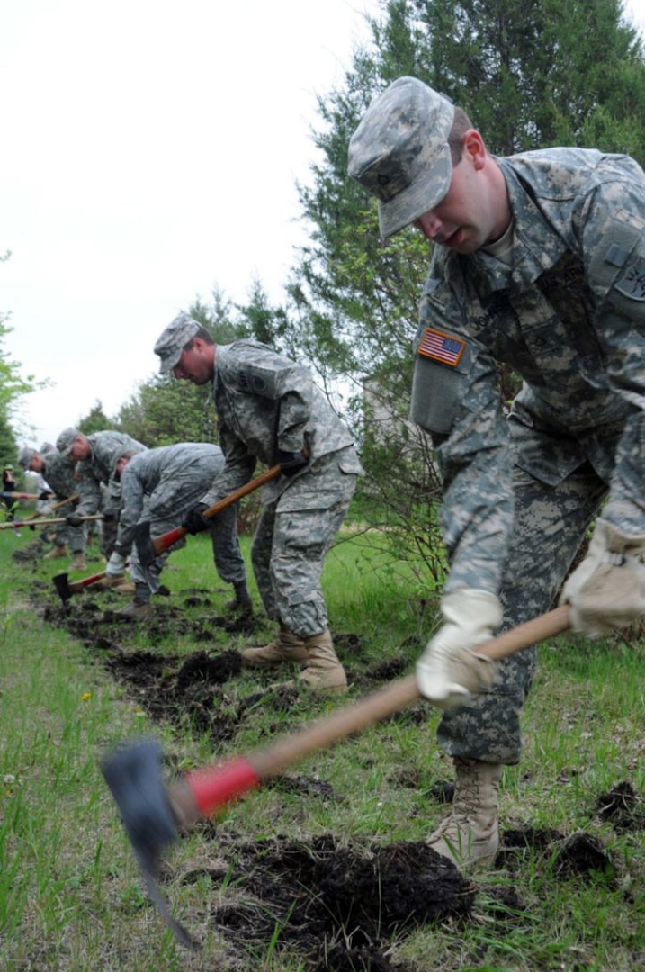 North Dakota National Guard Members dig a fire line during wildland firefighting training at the 119th Wing's Regional Training Site in Fargo, N.D., May 6, 2012. The training certified Guard members to fight wildfires and allows them to assist local and state officials should a wildfire situation occur.