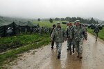 The Vice Chief of the National Guard Bureau, Air Force Lt. Gen. Joseph L. Lengyel, left, and Maj. Gen. Tim Reisch, the adjutant general of the South Dakota National Guard, visit Forward Operating Base Custer in Custer State Park, S.D., as a part the 30th annual Golden Coyote training exercise June 8, 2014. Lt. Gen. Lengyel visited the exercise where National Guard, Reserve, active-duty and allied nation forces come together for two-weeks to train in support of overseas contingency operations and homeland support missions. 