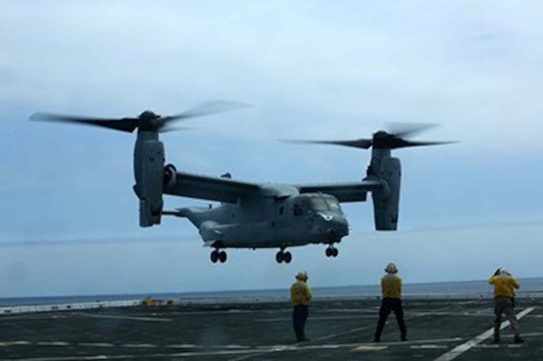 An MV-22B Osprey from Marine Medium Tiltrotor Squadron 163 departs from ...