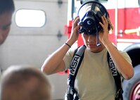 Senior Airman Jessica Wissenbach, 419th Civil Engineer Squadron, prepares to be tested on how she deals with hazardous materials during a recertification process at Hill Air Force Base, Utah, June 8, 2014. (U.S. Air Force photo/Senior Airman Allen Stokes)