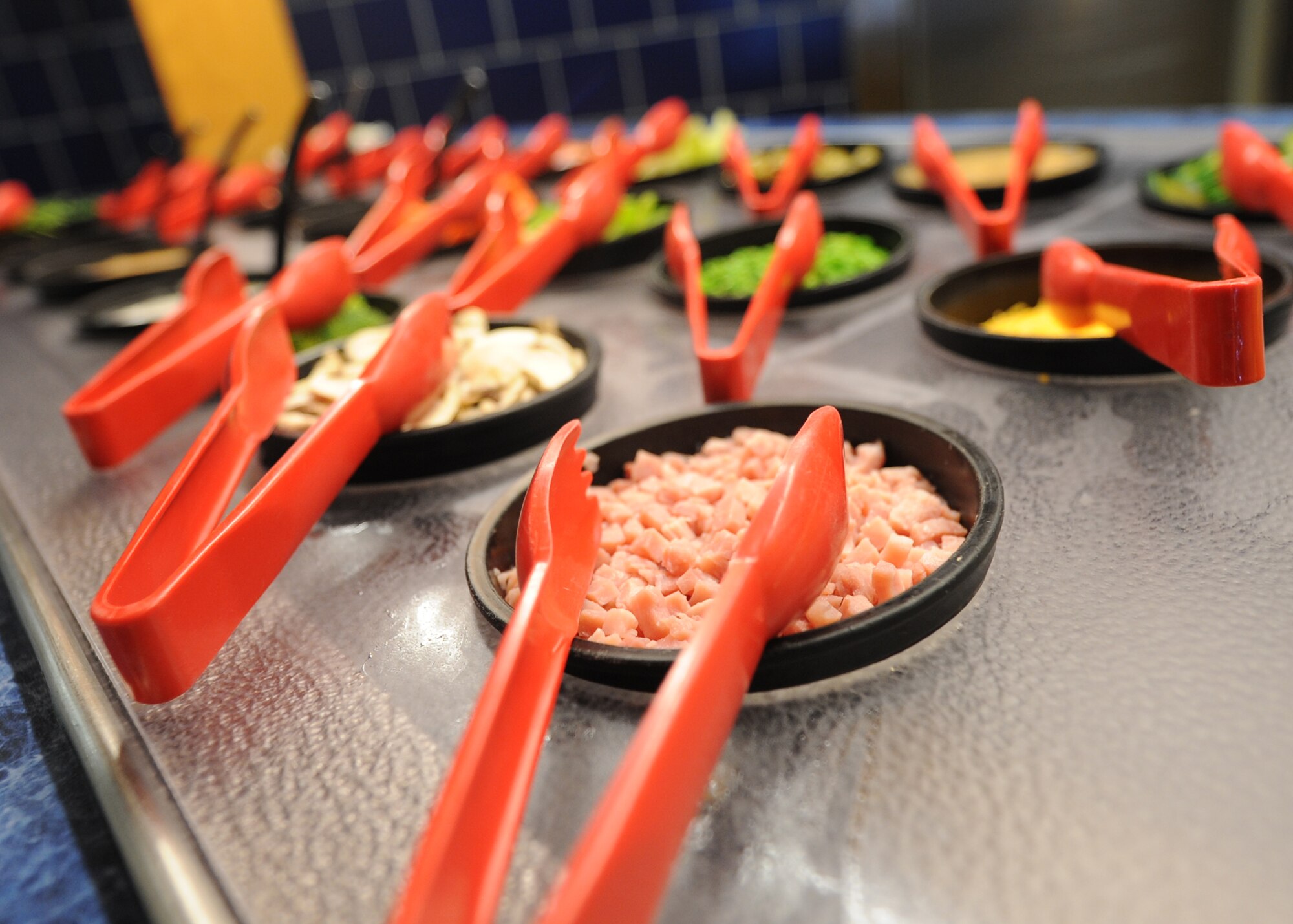 ALTUS AIR FORCE BASE, Okla. – Providing healthy meals for Airmen is one of the main priorities of the Solar Inn Dining Facility. The “Go for Green” program educates Airmen about eating healthier and categorizes food options served with green, yellow and red labels. (U.S. Air Force photo by Senior Airman Levin Boland/Released) 