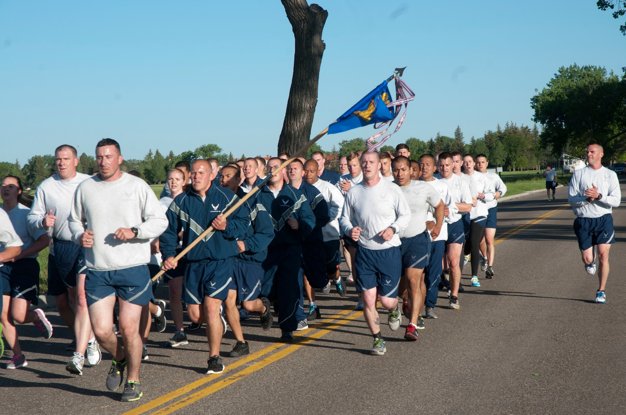 Master Sgt. Ricardo Borecki, 90th Logistics Squadron first sergeant, calls out jodies  during a memorial run on F.E. Warren Air Force Base, Wyo.,  June 10, 2014. The run was held in memory of Airman 1st Class Eric Barnes, an Airman who died on June 10, 2007, from a roadside bomb during a tour in Iraq. (U.S. Air Force photo by Airman Malcolm Mayfield)
