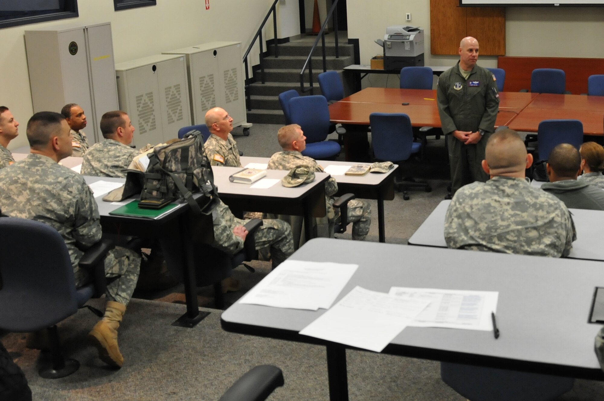 179th Airlift Wing Commander, Col. Gary McCue, welcomes a group of Chaplains. The Ohio National Guard is holding the Chaplains quarterly gathering at the 179th Airlift Wing, May 3, 2014, Mansfield, OH. Chaplains and Chaplains Assistants from both the Ohio Army National Guard and Ohio Air National Guard are attending.(U.S. Air National Guard Photo by TSgt Joseph Harwood \Released)