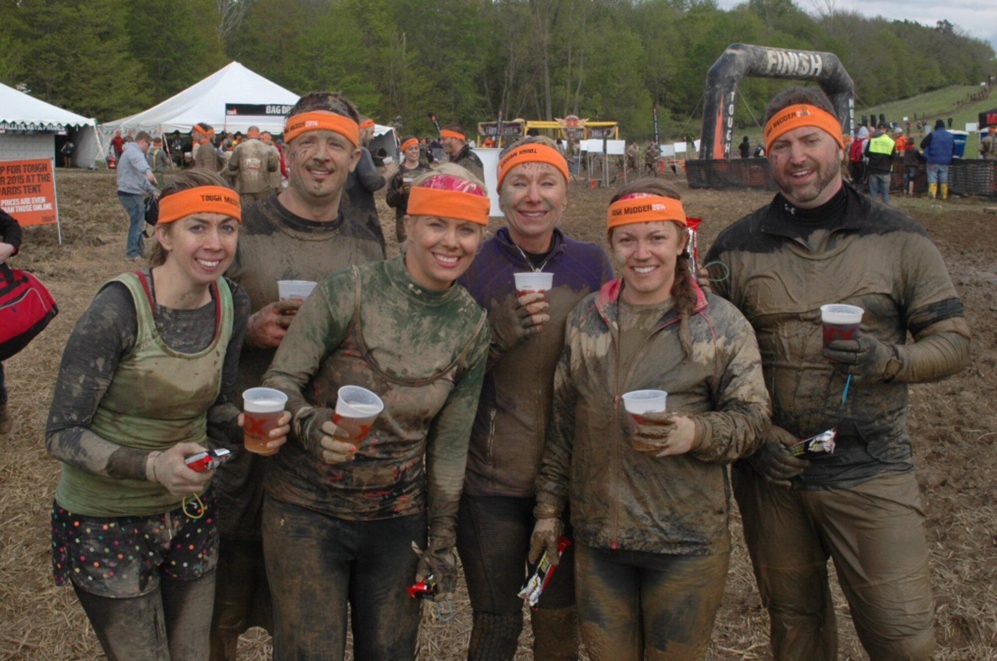 The 179th Airlift Wing’s Medical Dental Group (MDG) Mudders worked together to complete a challenging Tough Mudder course, May, 2014.  Pictured left to right Tech. Sgt. Sandi Gurnsey, Maj. Terry Walker, Tech. Sgt. Joeleen Mellars, Lt. Col. Sherri Campbell, Staff Sgt. Natasha Grau, and Capt. Ryan Bogart.(Courtesy Photo by Maj Terry Walker\Released)
