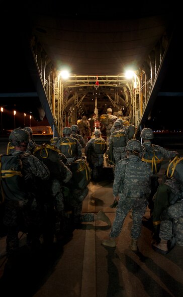U.S. Army Soldiers assigned to the 82nd Airborne Division board a 317th Airlift Group C-130J Super Hercules from Dyess Air Force Base, Texas, June 5, 2014, at Pope Army Airfield, Fort Bragg, N.C. The 317th AG provided airdrop support during a Joint Forcible Entry Exercise named Operation Geronimo. (U.S. Air Force photo by Senior Airman Peter Thompson/Released)