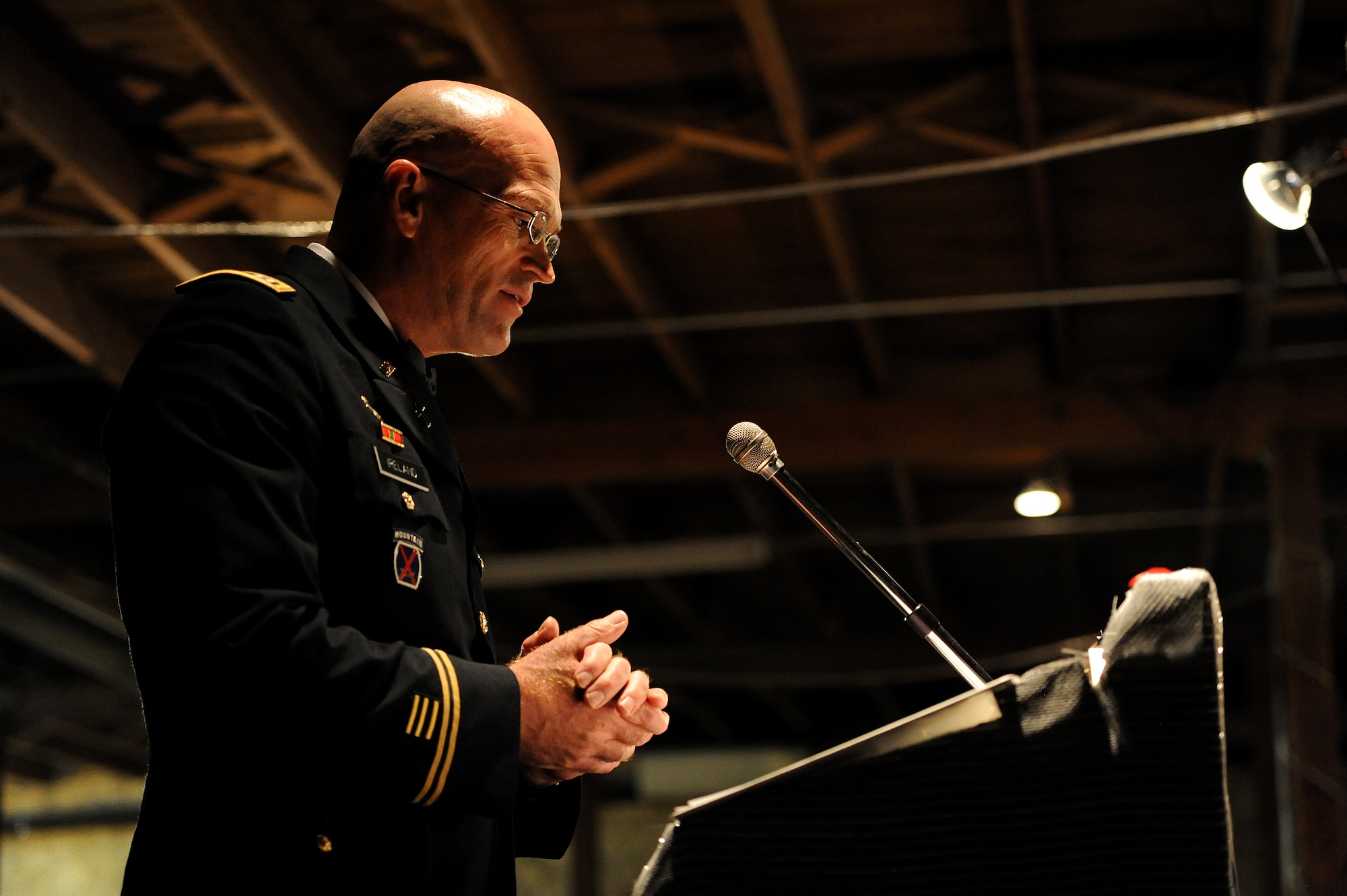 SAN ANGELO, Texas – Chaplain (Capt.) Patrick D. Ireland, 344th Military Intelligence Battalion, gives the invocation during the Army Ball at Fort Concho Stables here June 6. The invocation followed the singing of the national anthem. (U.S. Air Force photo/ Airman 1st Class Devin Boyer)