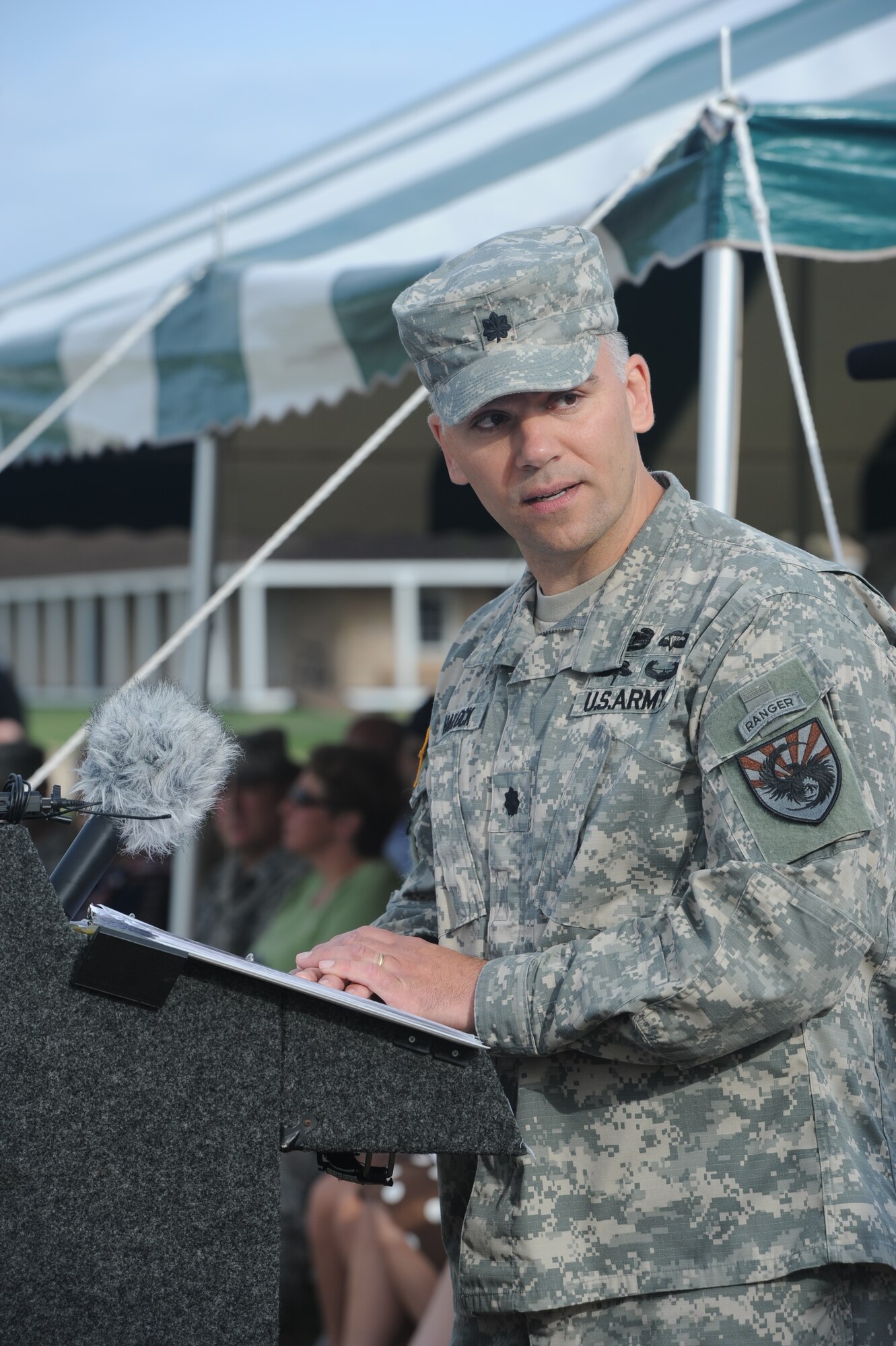 SAN ANGELO, Texas - Army Lt. Col. Jason D. Hallock, 344th Military Intelligence Battalion Commander, gives his first speech as commander to Goodfellow Air Force Base Soldiers at Fort Concho June 9. Hallock is the 11th commander of the 344th MI BN. (U.S. Air Force photo/ Staff Sgt. Laura R. McFarlane)