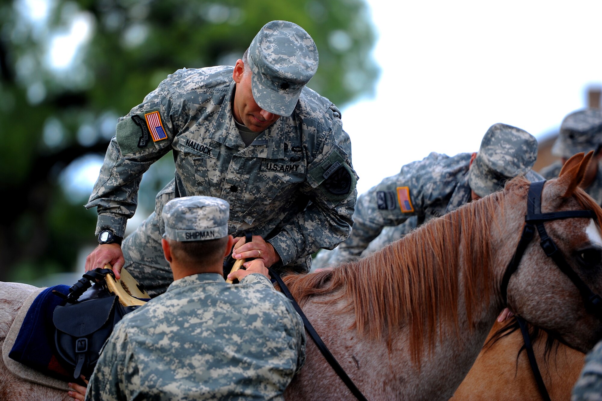 SAN ANGELO, Texas - Army Lt. Col. Jason D. Hallock, 344th Military Intelligence Battalion Commander, mounts a horse during the 344th MI BN Change of Command ceremony at Fort Concho June 9. The purpose of the ceremony was for Hallock to assume command of the 344th MI BN which is located at Goodfellow Air Force Base. (U.S. Air Force photo/ Airman 1st Class Devin Boyer)