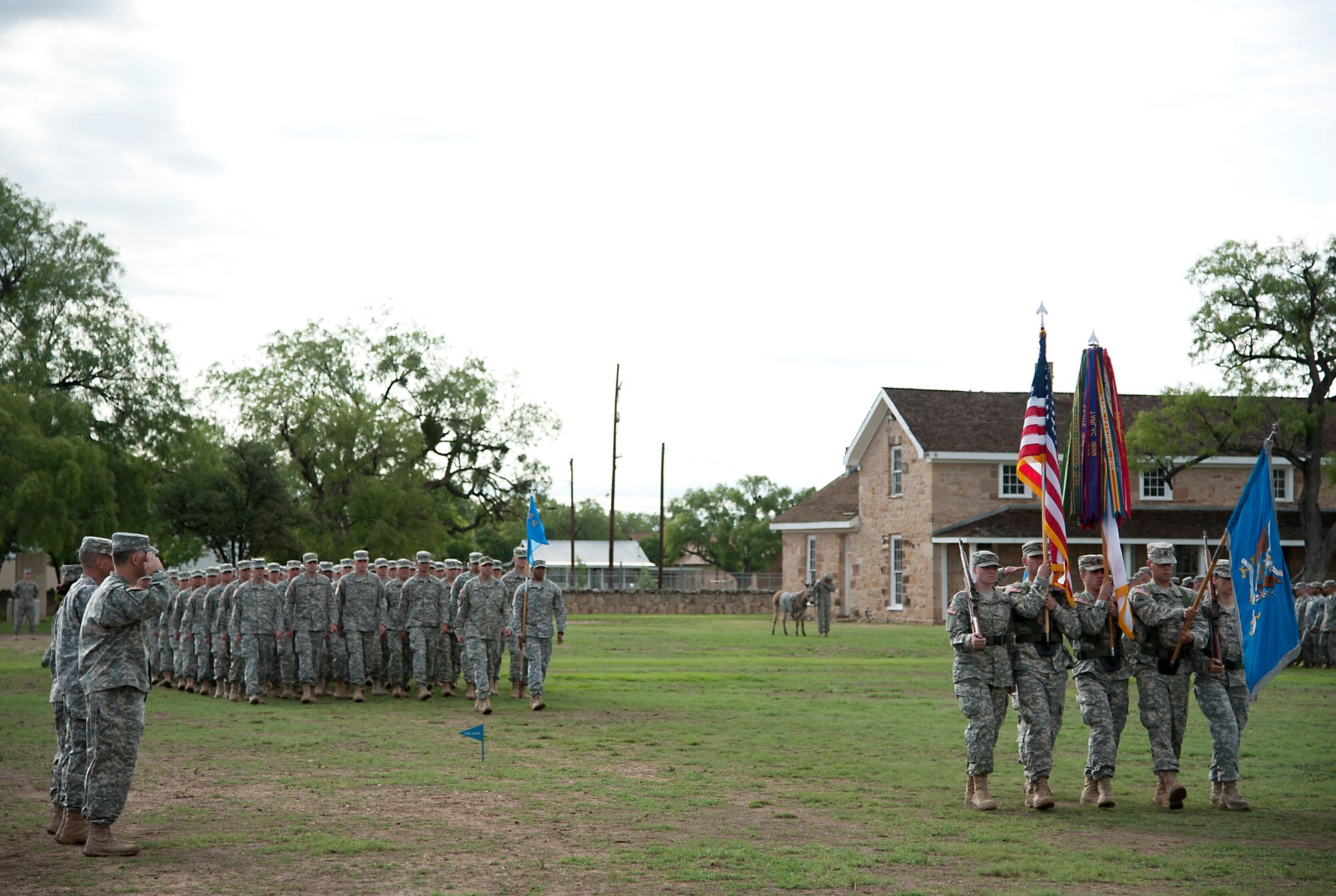 SAN ANGELO, Texas - Army Lt. Col. Jason D. Hallock, 344th Military Intelligence Battalion Commander, Col. Richard M. Monnard, 111th Military Intelligence Brigade Commander, and Army Lt. Col. Devon M. Blake salute the American flag during the 344th MI BN Change of Command ceremony at Fort Concho June 9. Hallock assumed command from Blake of the 344th MI BN which is stationed at Goodfellow Air Force Base. (U.S. Air Force photo/ Senior Airman Michael Smith)