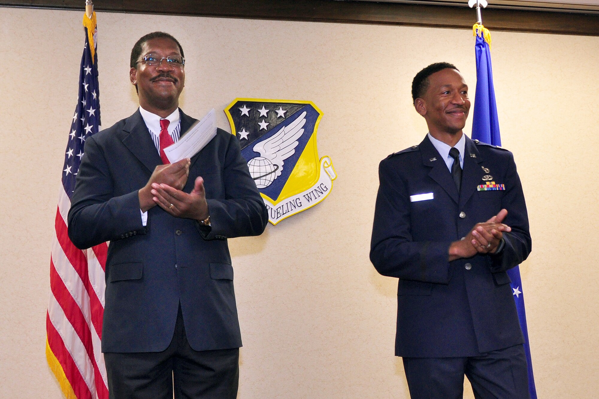 Maj. Craig Stokes, 916th Air Refueling Wing Equal Opportunity director, and his father, U.S. Army Maj. Stephen Stokes, celebrate Craig Stokes recent promotion in a ceremony held here over the June drill weekend. (USAF photo by Master Sgt. Wendy Lopedote, 916ARW/PA)
